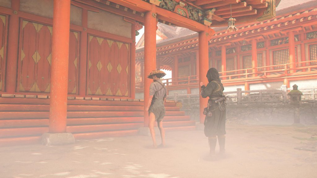 Naoe worships at a shrine in AC Shadows