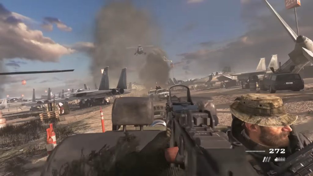 Captain Price is in the back of a jeep and Soap is firing at the enemies behind it