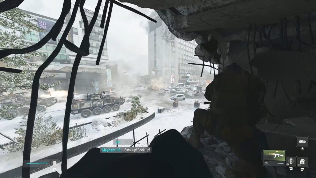 Allied tanks fire at an enemy tank amid a destructed city.