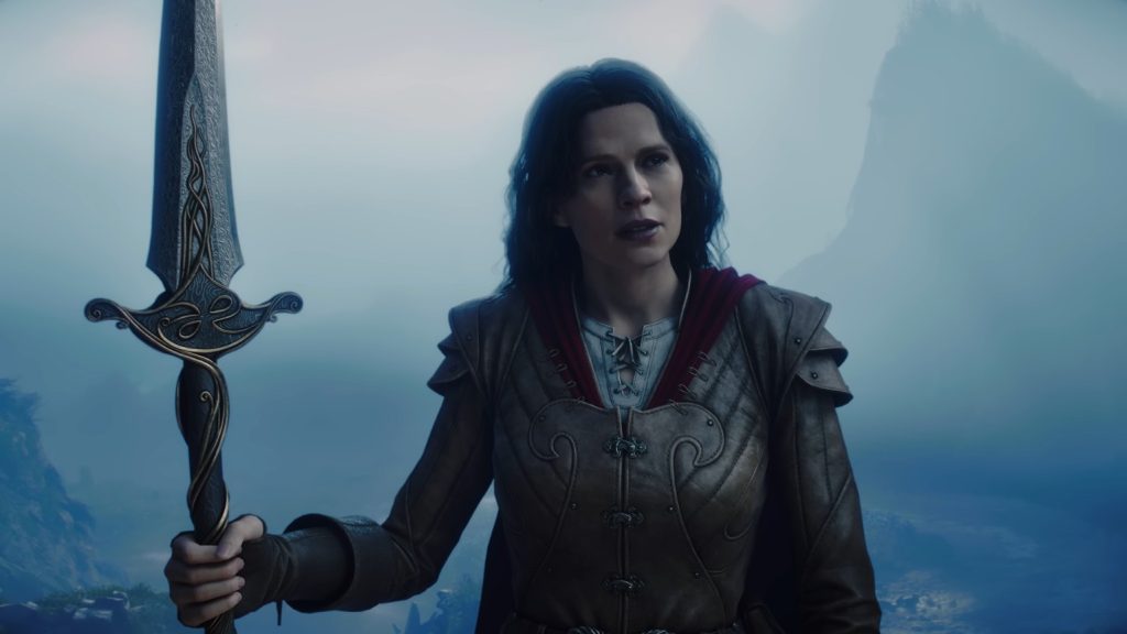 Hayley Atwell as Isabel, standing with a large spear