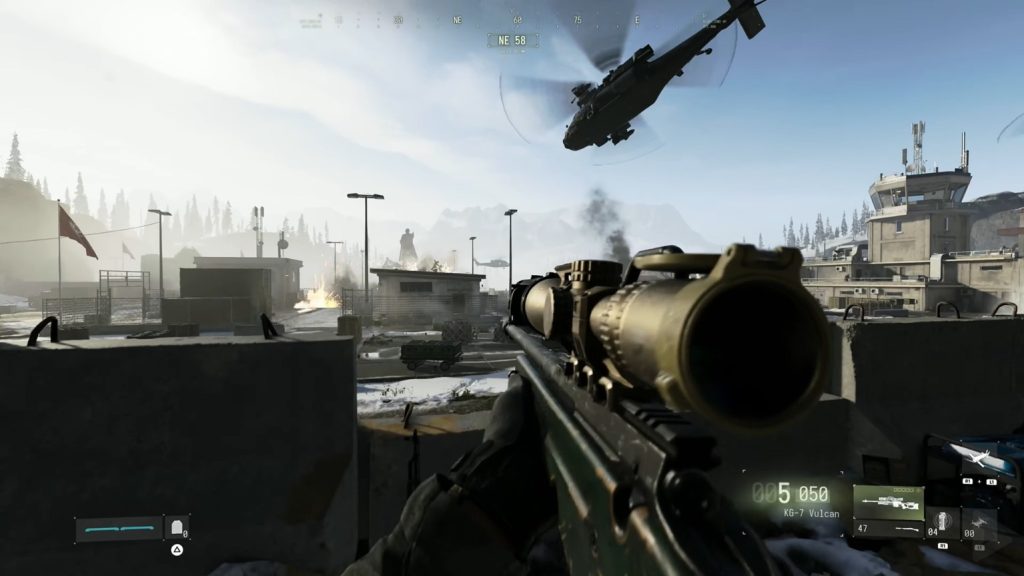 Friendly helicopter fires at enemies as we watches from a first-person perspective with a sniper in our hands