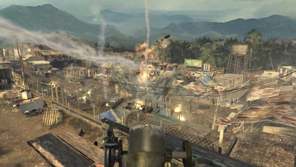 Yuri fires a mortar on a tin hut in the village