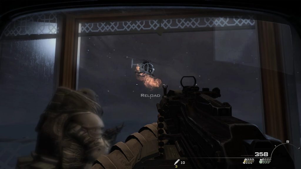 Yuri and Price standing in the elevator in their juggernaut suits and shooting at the helicopter