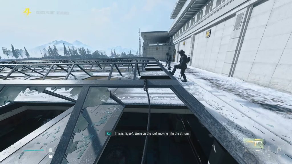 Soldiers prepares to rappel down the atrium from the roof. Ghost is warning us to stay out of the way