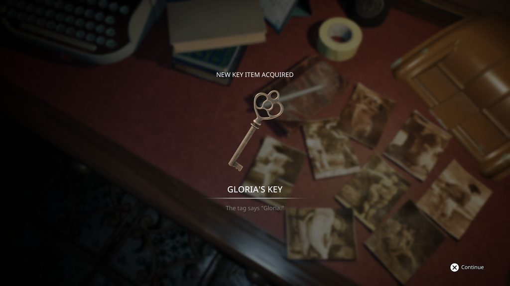 Remothered: Red Nun's Legay gloria key on a desk.