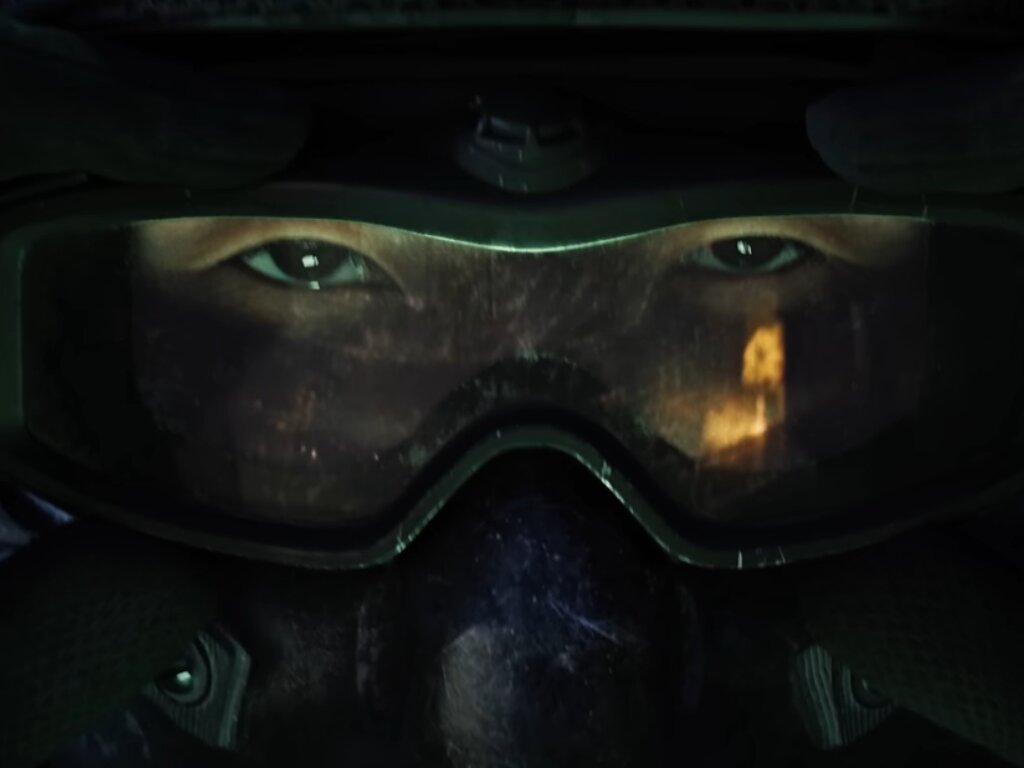 A soldier is seen wearing a goggle. Only eyes are visible